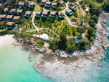 High angle view of swimming pool by building