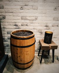 Coffee cup on table against wall