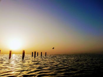 Scenic view of sea against sky during sunset