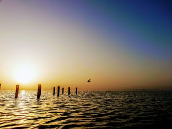 Scenic view of sea against sky during sunset