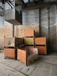 Close-up of metal containers in factory 