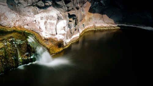 Scenic view of small waterfall