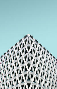 Low angle view of building against clear blue sky