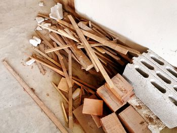 High angle view of logs on wooden floor