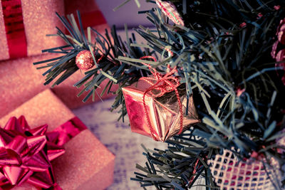 Close-up of christmas tree and presents