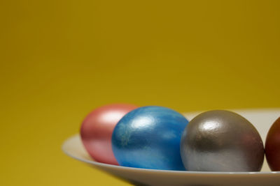 Close-up of multi colored candies on table