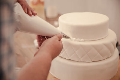 Close-up of preparing cake