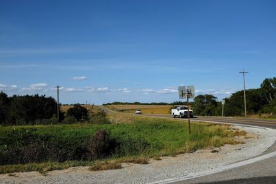 Car on country road against sky