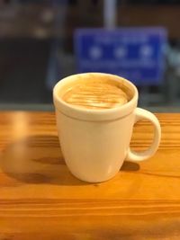 Close-up of cappuccino on table