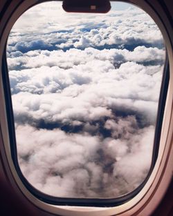 Clouds seen through airplane window