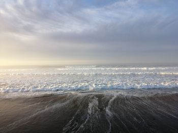 Scenic view of sea against sky during sunset