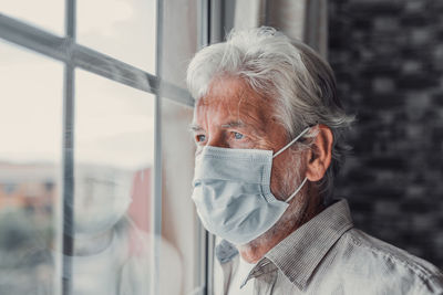 Portrait of man wearing mask