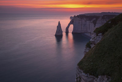 Scenic view of sea against sky during sunset