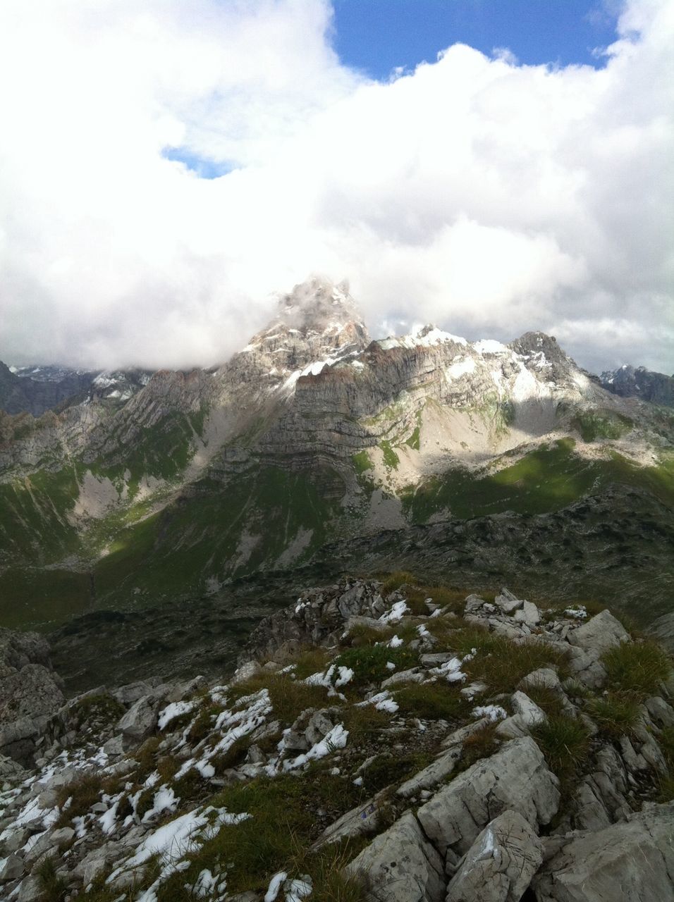 mountain, scenics, mountain range, tranquil scene, tranquility, sky, beauty in nature, landscape, nature, cloud - sky, rocky mountains, non-urban scene, physical geography, geology, snow, rock - object, cloudy, rock formation, idyllic, winter