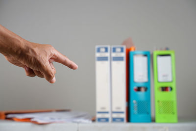 Close-up of hand holding book