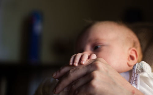 Portrait of cute baby boy at home