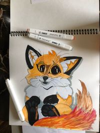 High angle view of multi colored paper on table