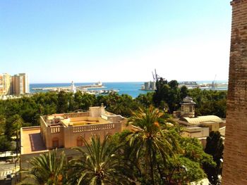 View of beach with city in background