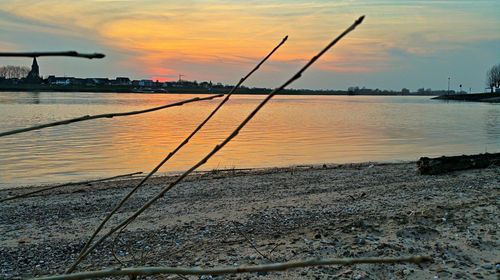 Scenic view of sea at sunset