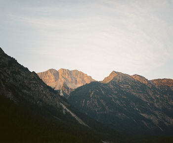 Scenic view of mountains against sky at plansee in austria. shot on kodak portra 400 film. 