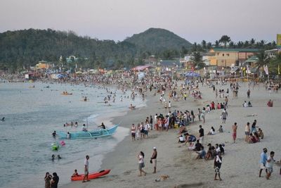 People enjoying at beach