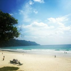 Scenic view of sea against cloudy sky