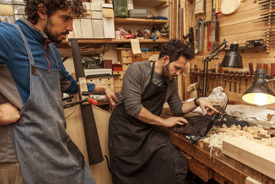 People working in kitchen