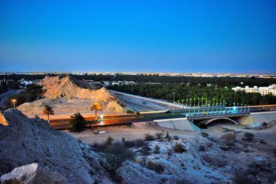 High angle view of bridge against clear blue sky