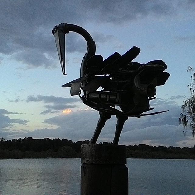 sky, water, metal, cloud - sky, cloud, no people, lake, outdoors, metallic, safety, tranquility, nature, river, day, rusty, protection, pole, reflection, connection, silhouette