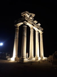 Low angle view of historical building at night