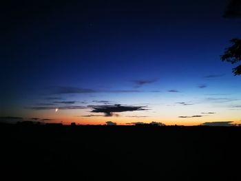 Scenic view of silhouette landscape against sky during sunset