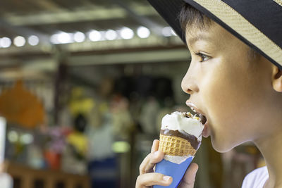 Close-up of boy eating ice cream