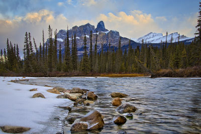 Scenic view of castle mountain with bow river  in front