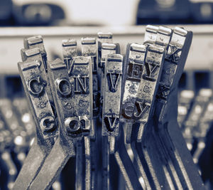 Close-up of machine part on table