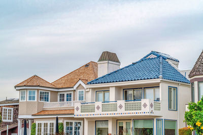 Low angle view of residential buildings against sky