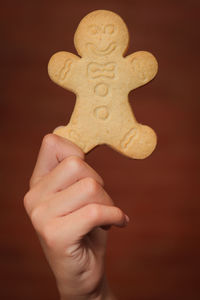 Close-up of hand holding cookies