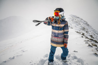 Young woman on a ski vacation in the mountains, portrait. great rider holiday in ski resort