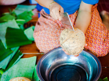 Midsection of woman preparing food