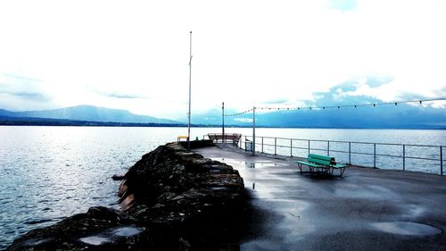 Scenic view of sea against cloudy sky