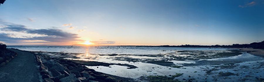 Scenic view of sea against sky during sunset