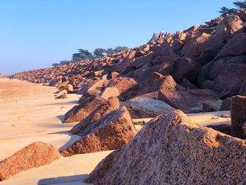 Rock formation on land against sky