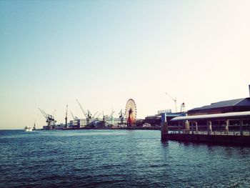 Commercial dock against clear sky