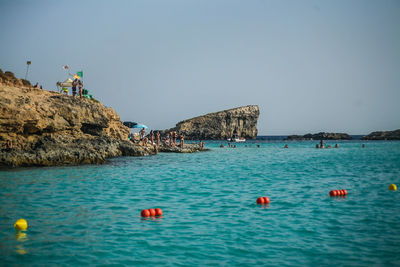 Scenic view of sea against clear sky