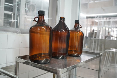 Close-up of bottles on table