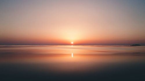 Scenic view of sea at sunset