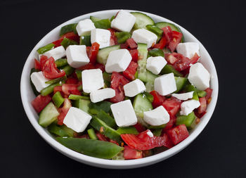 Bulgarian shopska type salad with tomato, cucumber, peppers and feta cheese