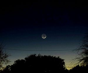 Low angle view of moon in sky