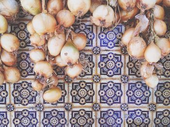 High angle view of onions on floor