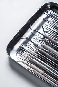 High angle view of container on table against white background