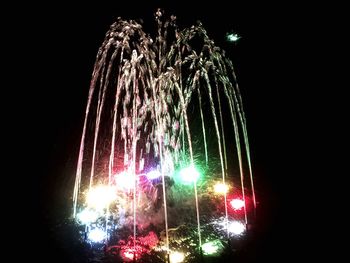 Low angle view of firework display